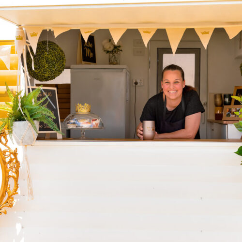 Food truck vendor smiling