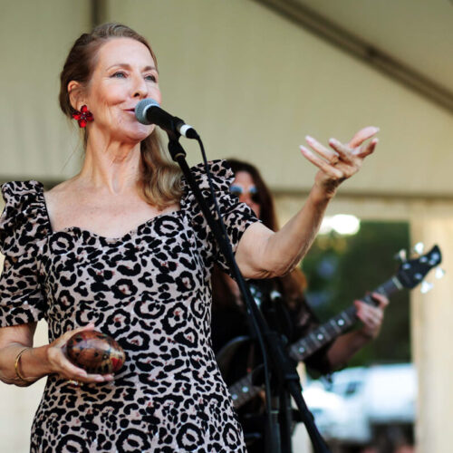 Woman performing on stage at the Darlington Arts Festival